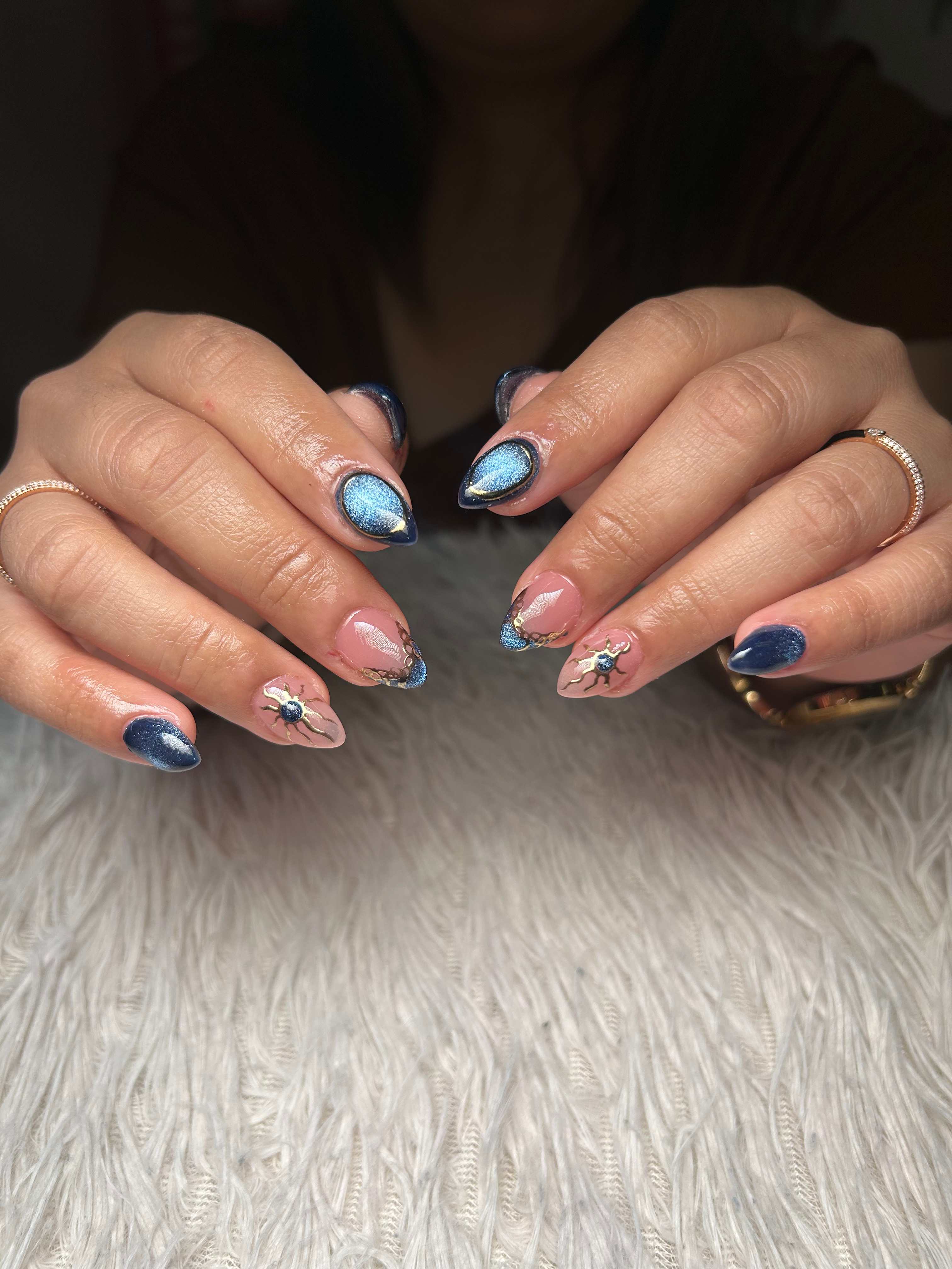 Almond nails in mocha cat-eye polish